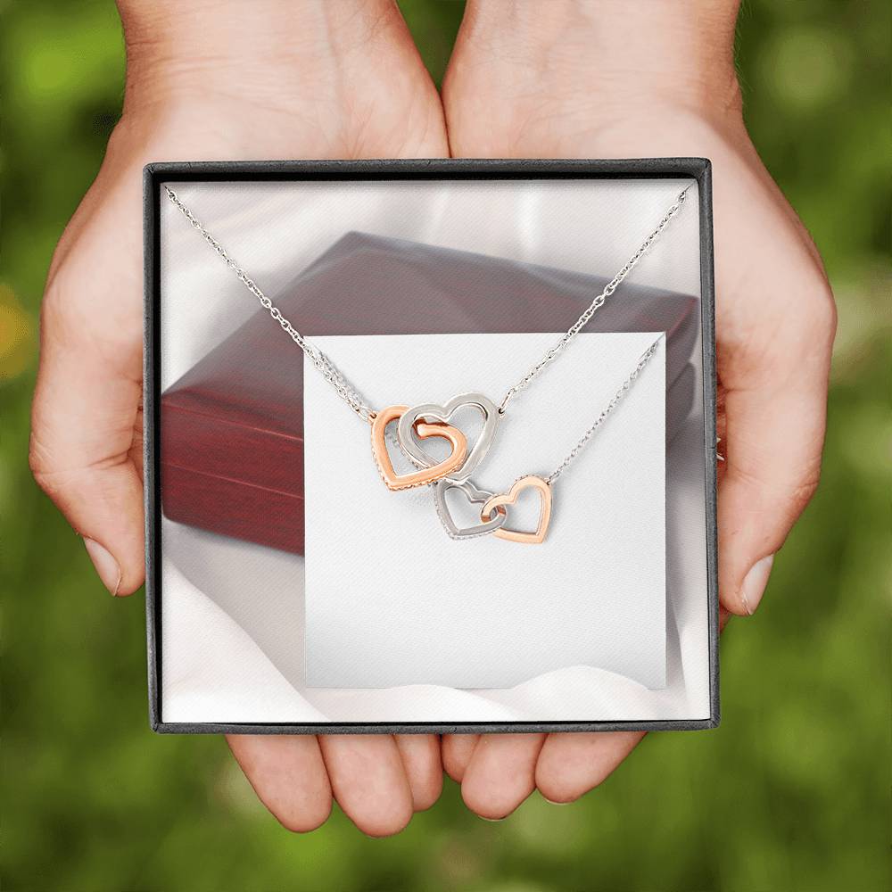 INTERLOCKING HEART NECKLACE