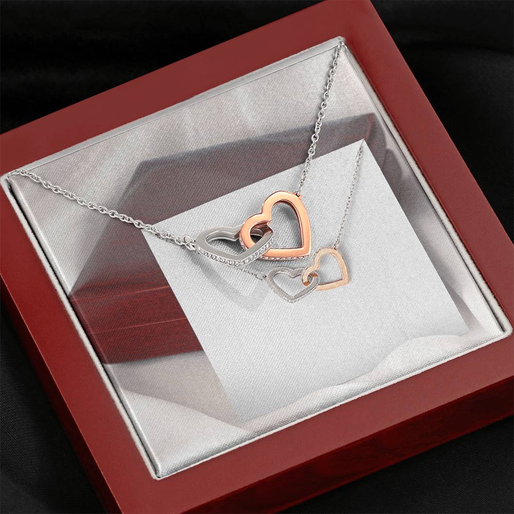 INTERLOCKING HEART NECKLACE