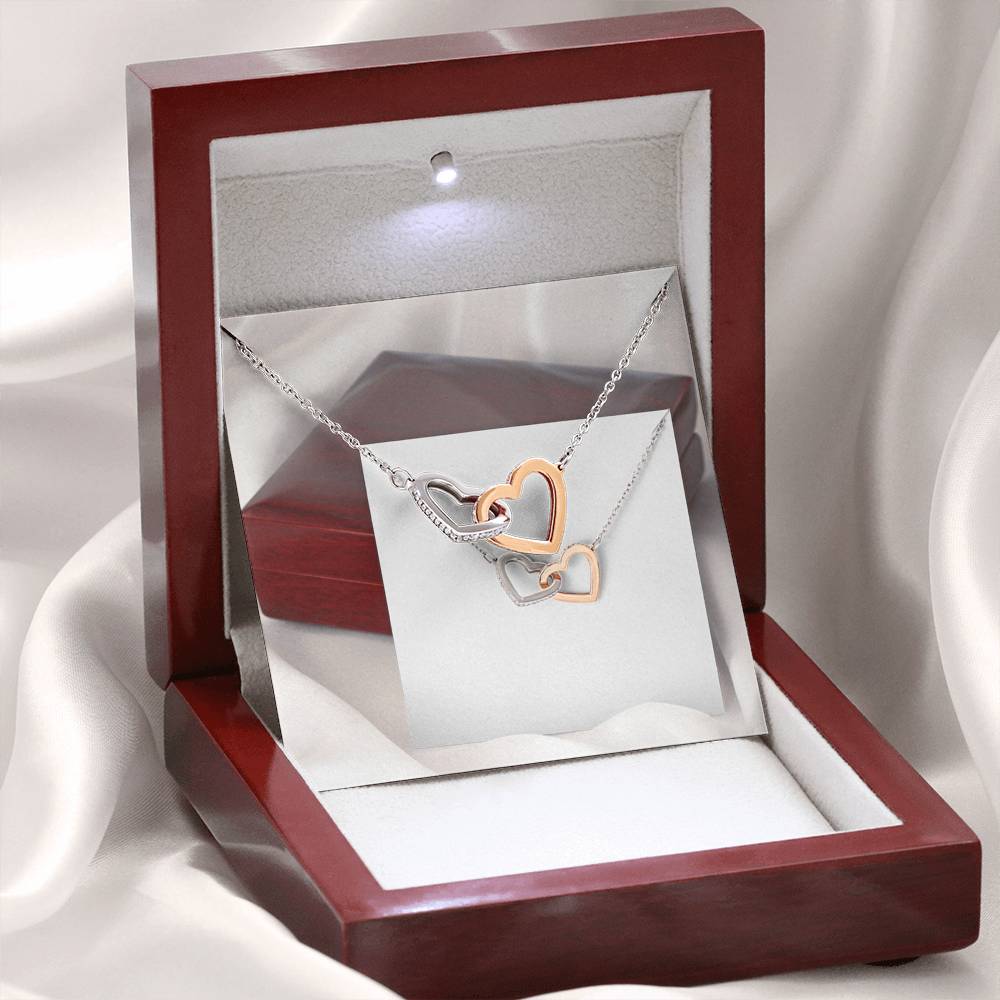 INTERLOCKING HEART NECKLACE
