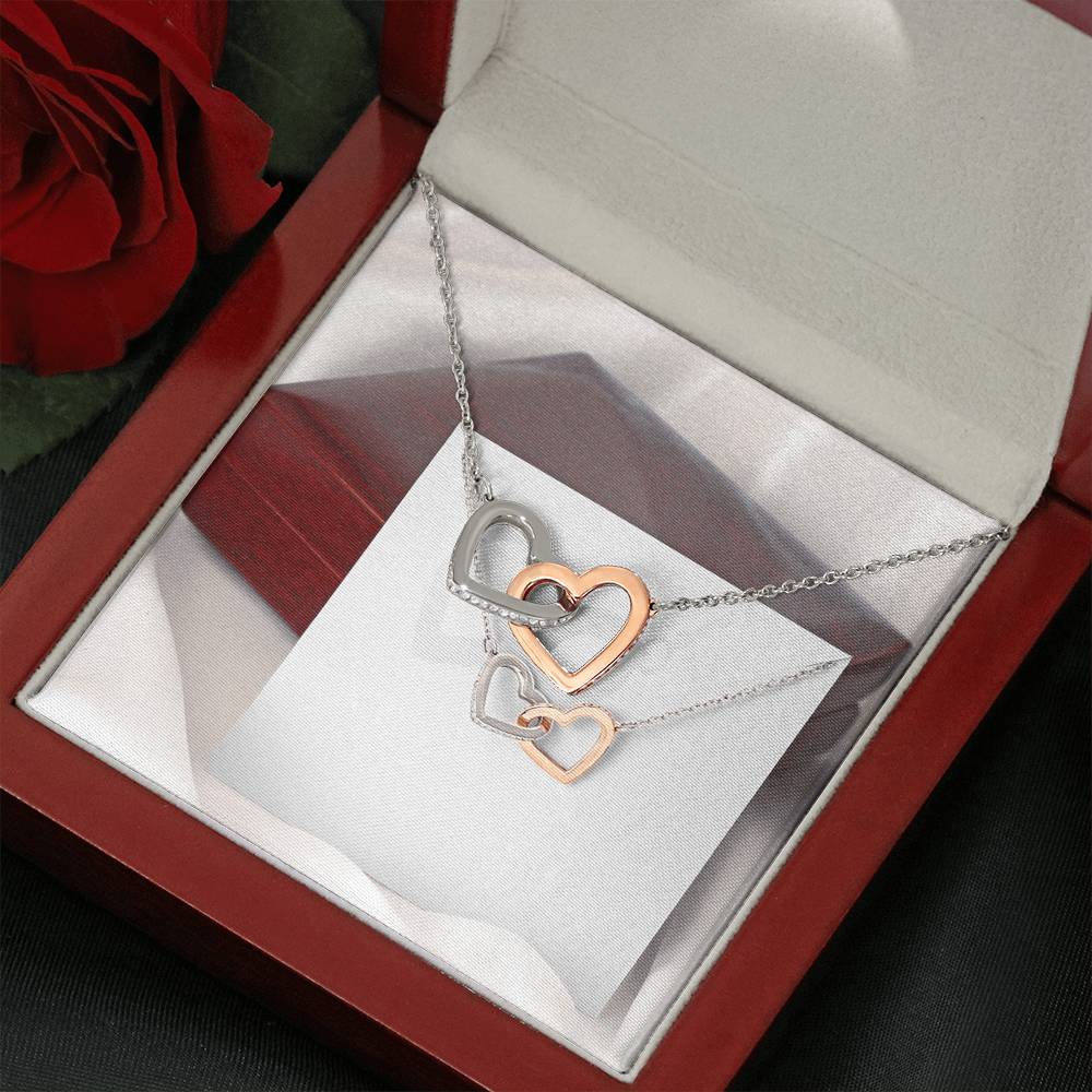 INTERLOCKING HEART NECKLACE