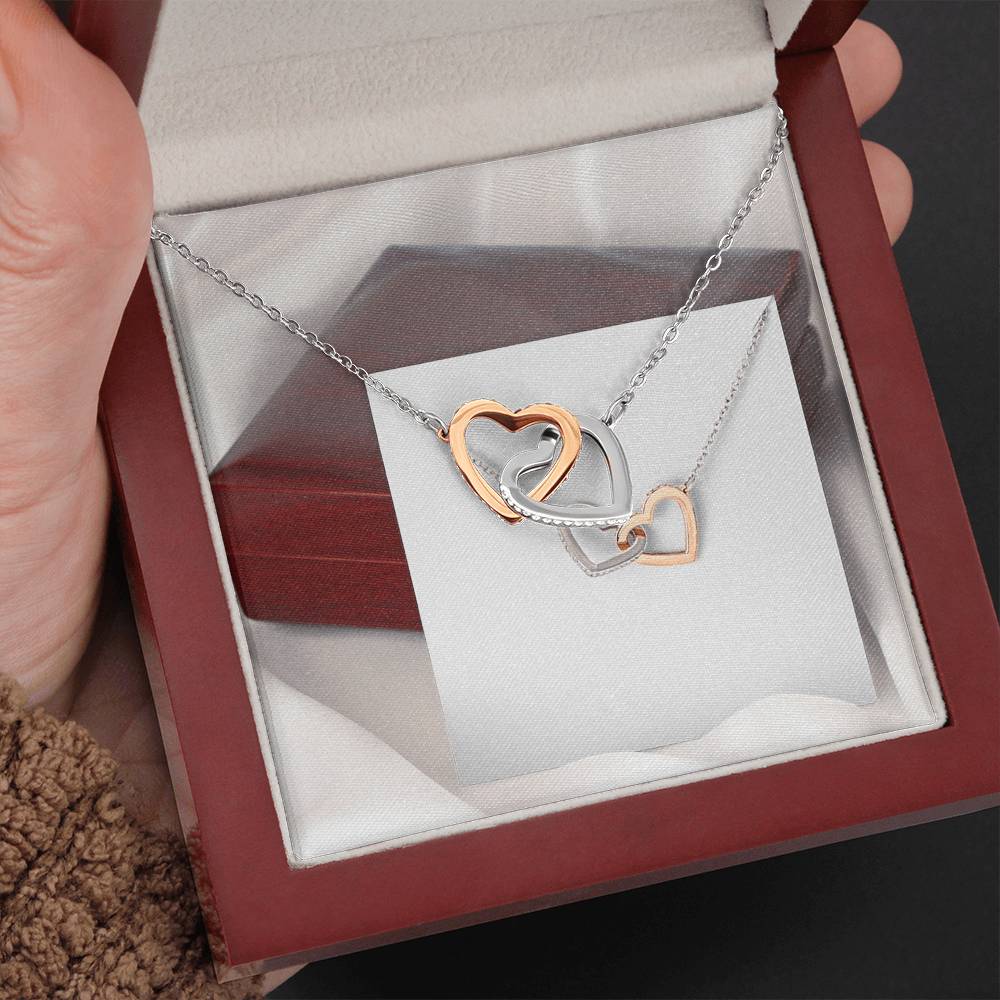 INTERLOCKING HEART NECKLACE